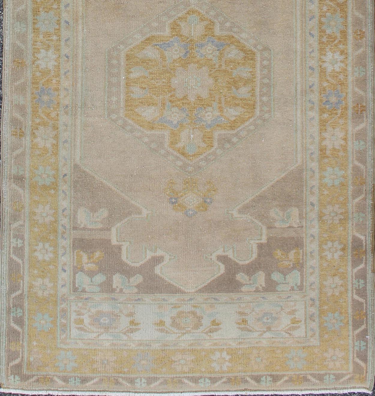 Acid green and gray vintage Turkish Oushak runner with floral medallions, rug en - 140350, country of origin / type: Turkey / Oushak, circa 1940. This vintage Oushak runner features a unique blend of cheerful colors and an intricately beautiful de... - Keivan Woven ArtsEN - 140350 - 5634Rug
