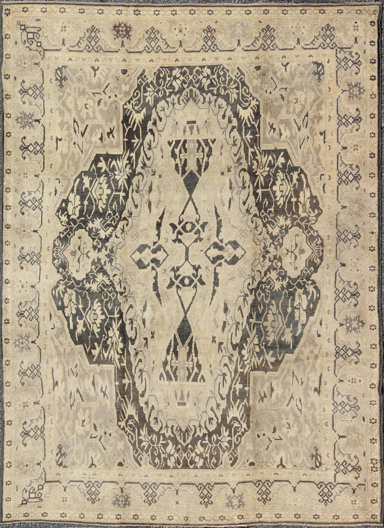 Turkish Antique Sevas Rug with Fine Weave in Gray Green and Taupe. Measures: 6'6 x 8'9. Measures: 6'6 x 8'9. Set on a deep gray green background, this fabulous antique Turkish Sevas showcases a large and bold medallion surrounded by flowers a... - Keivan Woven ArtsEN - 140356 - 6045Rug