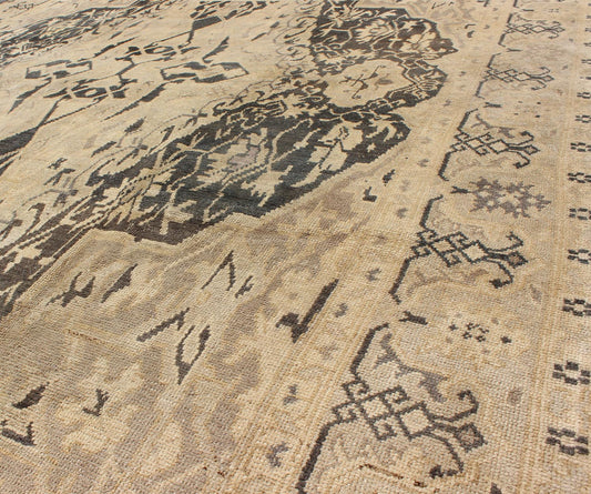 Turkish Antique Sevas Rug with Fine Weave in Gray Green and Taupe. Measures: 6'6 x 8'9. Measures: 6'6 x 8'9. Set on a deep gray green background, this fabulous antique Turkish Sevas showcases a large and bold medallion surrounded by flowers a... - Keivan Woven ArtsEN - 140356 - 6045Rug