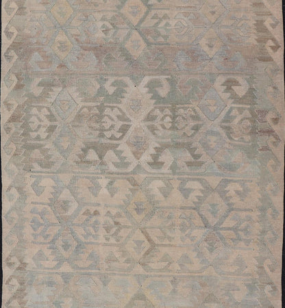 Gallery Turkish Vintage Flat - Weave Tribal Designed Kilim in Earthy Tones This vintage Turkish flat weave Kilim features tribal relics and faded earthy neutrals. The repeating design covers the entire field of muted light blue, caramel, taupe and gr... - Keivan Woven ArtsEN - 14037 - 23738