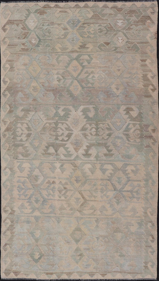 Gallery Turkish Vintage Flat - Weave Tribal Designed Kilim in Earthy Tones This vintage Turkish flat weave Kilim features tribal relics and faded earthy neutrals. The repeating design covers the entire field of muted light blue, caramel, taupe and gr... - Keivan Woven ArtsEN - 14037 - 23738Rug