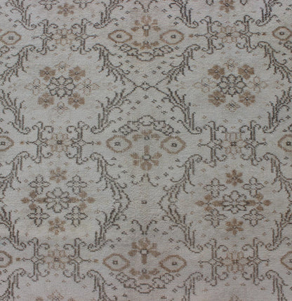 Vintage Turkish Oushak Carpet with Ivory Ground and Repeating Floral Design. Keivan Woven Arts / circa/1940 rug/ EN - 140436 Mid - 20th Century Vintage Oushak. Measures: 5'2 x 8'9. The design of this beautiful vintage Oushak rug from mid - 20th centu... - Keivan Woven ArtsEN - 140436 - 5664Rug