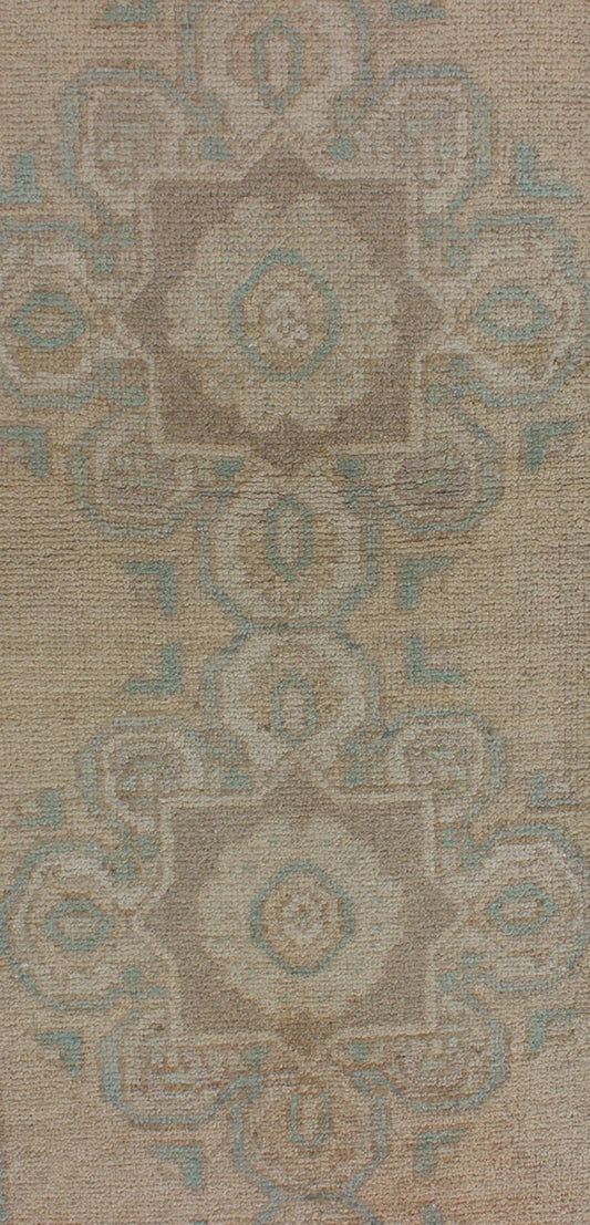 Floral medallion vintage Turkish Oushak runner with faded color palette, rug en - 140461, country of origin / type: Turkey / Oushak, circa 1930 This vintage Turkish Oushak gallery rug (1930) features a unique blend of colors and an intricately bea... - Keivan Woven ArtsEN - 140461 - 6049Rug