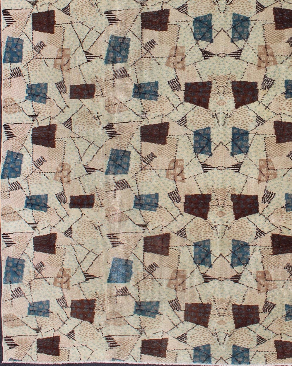 Mid - Century Modern Turkish Rug This extraordinary one - of - a - kind Mid - Century Modern rug features a deconstructed pattern in a spectrum of earthy hues, various blues, and soft tones, along with brown color elements and highlights. Measures: 6'8... - Keivan Woven ArtsEN - 140468 - 6053Rug