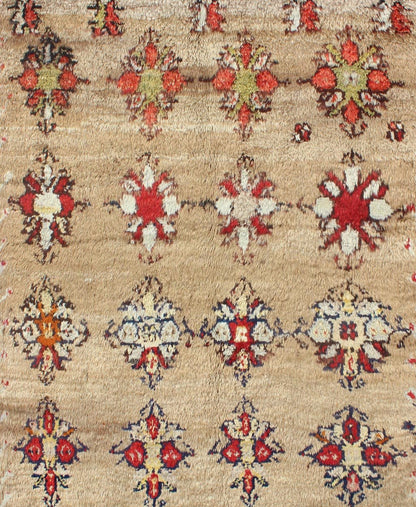 Angora Turkish Tulu Carpet with Colorful Floral Designs Set on Sand Field Angora Turkish Tulu Carpet Antique rug//en - 140522 origin/turkey kwarugs his Tulu carpet features several multicolored floral motifs laid across a sand - colored field... - Keivan Woven ArtsEN - 140522 - 6370Rug