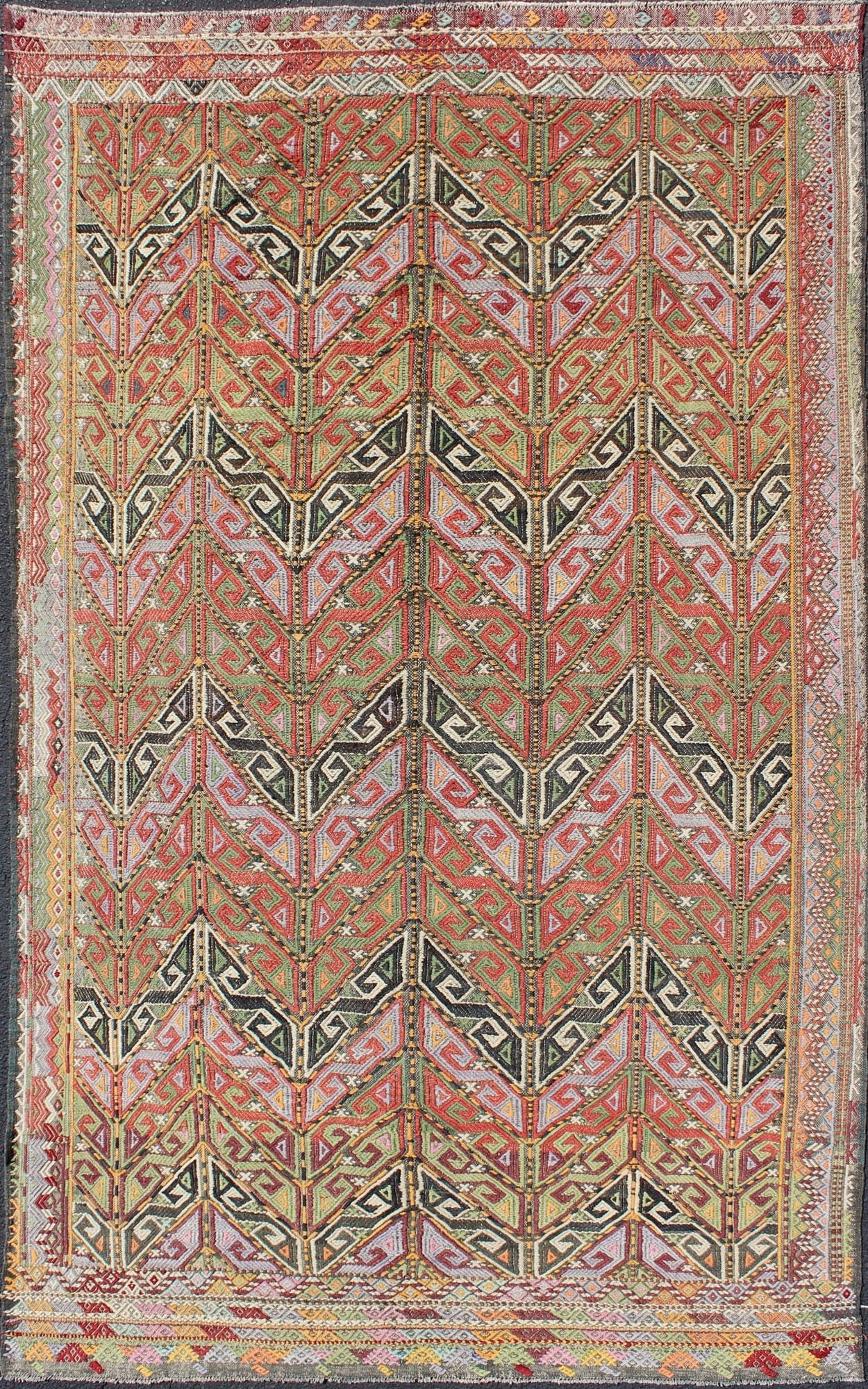 Vintage Embroidered Kilim Jajeem Rug Set on a multicolored background, this geometric Kilim Jajeem bears a large - scale repeating pattern. Colors include an array of gold, light green, pink, light blue, charcoal, red, yellow, orange and ivory. ... - Keivan Woven ArtsEN - 140532 - 6065Rug