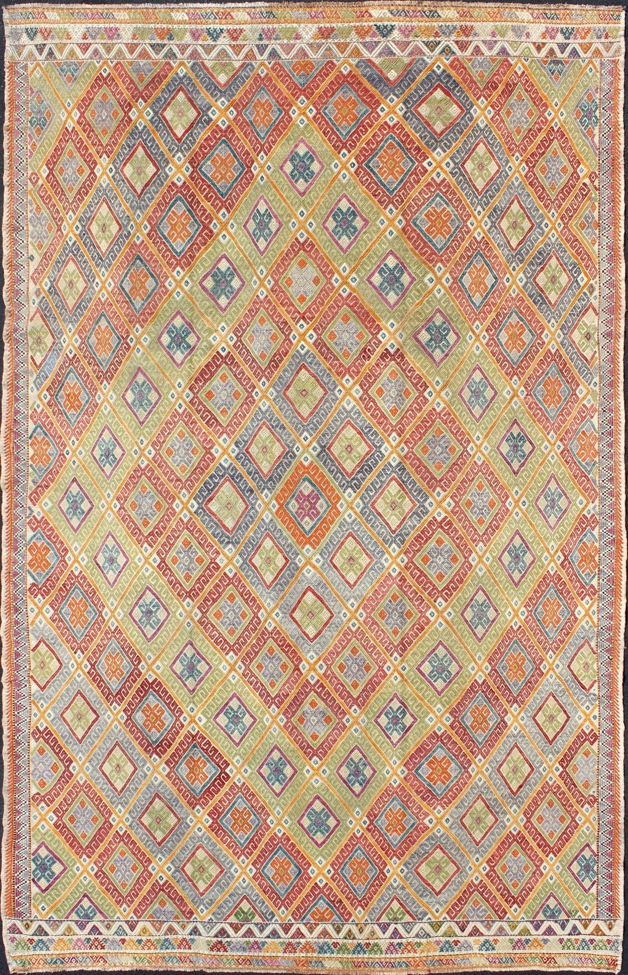 Geometric diamond vintage Turkish Kilim rug, bright and colorful, Vintage Turkish Kilim Rug, Keivan Woven Arts / rug EN - 140534, country of origin / type: Turkey / Kilim, circa 1950. This geometric Kilim from Turkey bears a repeating large diamon... - Keivan Woven ArtsEN - 140534 - 6069Rug