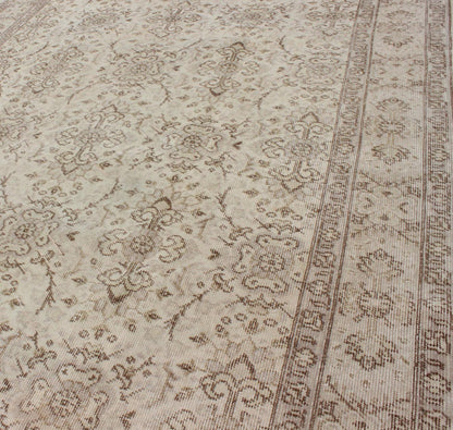 Vintage Turkish Oushak Carpet with Botanical Motifs Set on an Cream Ground Vintage Turkish Oushak Carpet with Botanical Motifs Set on an Ivory Ground Vintage Oushak. Keivan Woven Arts / Rug/EN - 140567. Mid - 20th Century Turkish. Measures: 5'7 ... - Keivan Woven ArtsEN - 140567 - 5700Rug