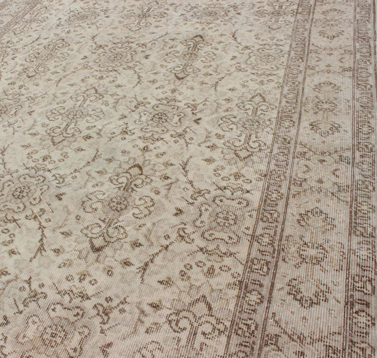 Vintage Turkish Oushak Carpet with Botanical Motifs Set on an Cream Ground Vintage Turkish Oushak Carpet with Botanical Motifs Set on an Ivory Ground Vintage Oushak. Keivan Woven Arts / Rug/EN - 140567. Mid - 20th Century Turkish. Measures: 5'7 ... - Keivan Woven ArtsEN - 140567 - 5700Rug