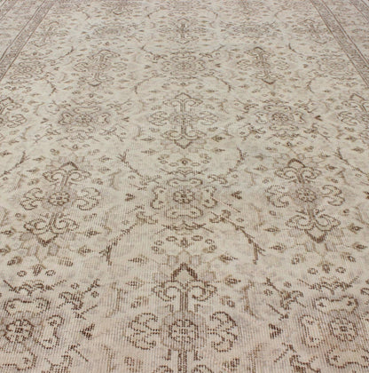 Vintage Turkish Oushak Carpet with Botanical Motifs Set on an Cream Ground Vintage Turkish Oushak Carpet with Botanical Motifs Set on an Ivory Ground Vintage Oushak. Keivan Woven Arts / Rug/EN - 140567. Mid - 20th Century Turkish. Measures: 5'7 ... - Keivan Woven ArtsEN - 140567 - 5700Rug