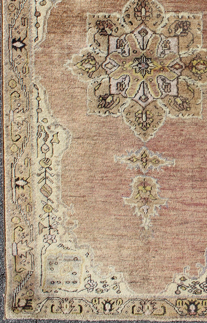 This vintage Turkish Oushak rug features an intricately beautiful design with a stylized floral aesthetic. The central medallion is surrounded by four cornices in the central field. The various shades of cream, yellow, charcoal, and gray blend beautifu... - Keivan Woven ArtsEN - 140587 - 6374Rug