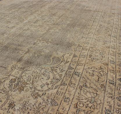 Distressed Turkish Carpet with Floral Design in Taupe, Gray and Ivory This vintage Turkish carpet has been neutralized to create faded pigments with a floral design. Neutral colors include many shades of taupe, gray, and ivory, with brown outlin... - Keivan Woven ArtsEN - 140589 - 6103Rug