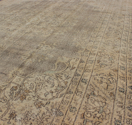Distressed Turkish Carpet with Floral Design in Taupe, Gray and Ivory This vintage Turkish carpet has been neutralized to create faded pigments with a floral design. Neutral colors include many shades of taupe, gray, and ivory, with brown outlin... - Keivan Woven ArtsEN - 140589 - 6103Rug