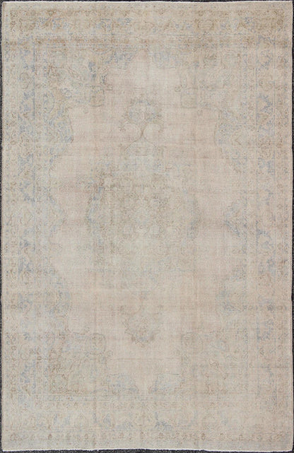 Muted Vintage Turkish Oushak Rug with Distinctive Medallion and Floral Designs Classical designs and muted colors are hallmarks of Oushak carpets. In this rare vintage Oushak from 1940s Turkey, a distinctive medallion pattern is framed by ornate... - Keivan Woven ArtsEN - 140593 - 6107Rug