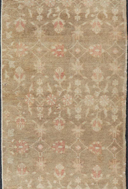 All - over floral vintage Turkish Oushak runner in tan with salmon and taupe hints, rug en - 140600, country of origin / type: Turkey / Oushak, circa 1940 This unique vintage Turkish Oushak runner features an all - over design of subdued ivory blossom... - Keivan Woven ArtsEN - 140600 - 6111Rug