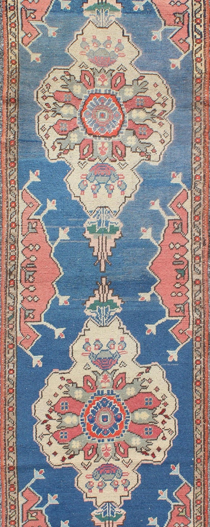 Grand dual medallion Oushak vintage runner from Turkey in red and blue, rug en - 140752, country of origin / type: Turkey / Oushak, circa 1940 This Turkish runner features a dual central medallion design as well as patterns of smaller geometric an... - Keivan Woven ArtsEN - 140752 - 5995Rug