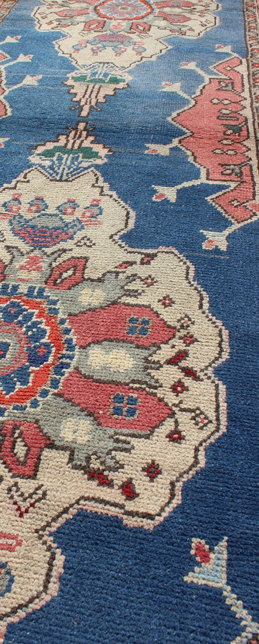 Grand dual medallion Oushak vintage runner from Turkey in red and blue, rug en - 140752, country of origin / type: Turkey / Oushak, circa 1940 This Turkish runner features a dual central medallion design as well as patterns of smaller geometric an... - Keivan Woven ArtsEN - 140752 - 5995