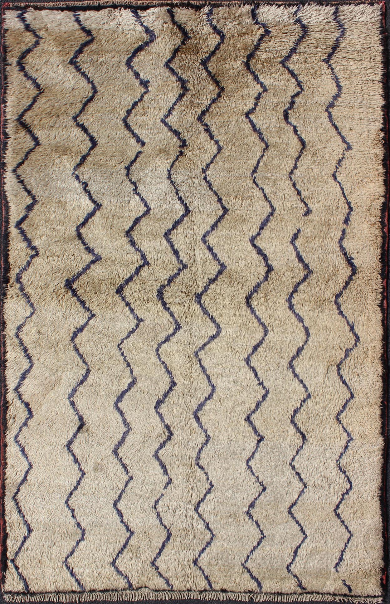 This stunning two - color Tulu rug features dark blue lines on a off sandy/taupe background. The pile is lush and of very high quality wool. This simple yet exquisite design makes this rug a perfect fit for a variety of modern, transitional, traditional ... - Keivan Woven ArtsEN - 140791 - 6015Rug