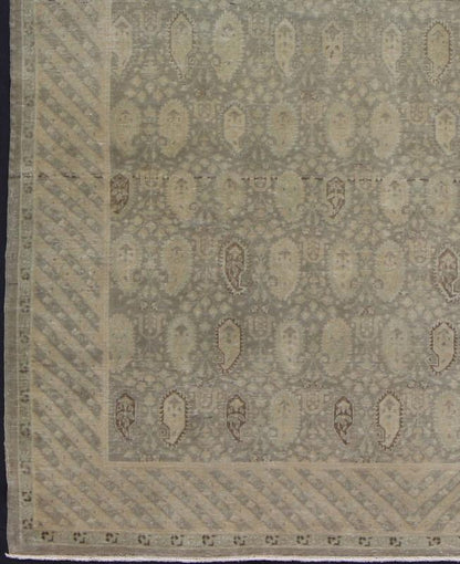 Muted Vintage Turkish Sivas with Paisley Design in Taupe, Gray - Green, And Camel Measures: 6'8'' x 9'0'' Stylized paisley motifs are featured in a repeating pattern on this Sivas wool rug. A blend of Persian inspiration and Turkish design... - Keivan Woven ArtsEN - 141067 - 7175Rug
