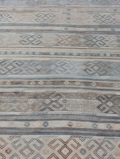 Measures: 5'9 x 7'7. This flat - woven Kilim runner from Turkey features an enticing composition consisting of stripes with fascinating geometric designs rendered in natural tones of brown and gray, as well as some blue shades. Vintage Kil... - Keivan Woven ArtsEN - 141087 - 11177Rug