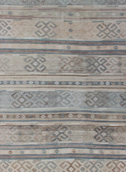 Measures: 5'9 x 7'7. This flat - woven Kilim runner from Turkey features an enticing composition consisting of stripes with fascinating geometric designs rendered in natural tones of brown and gray, as well as some blue shades. Vintage Kil... - Keivan Woven ArtsEN - 141087 - 11177Rug
