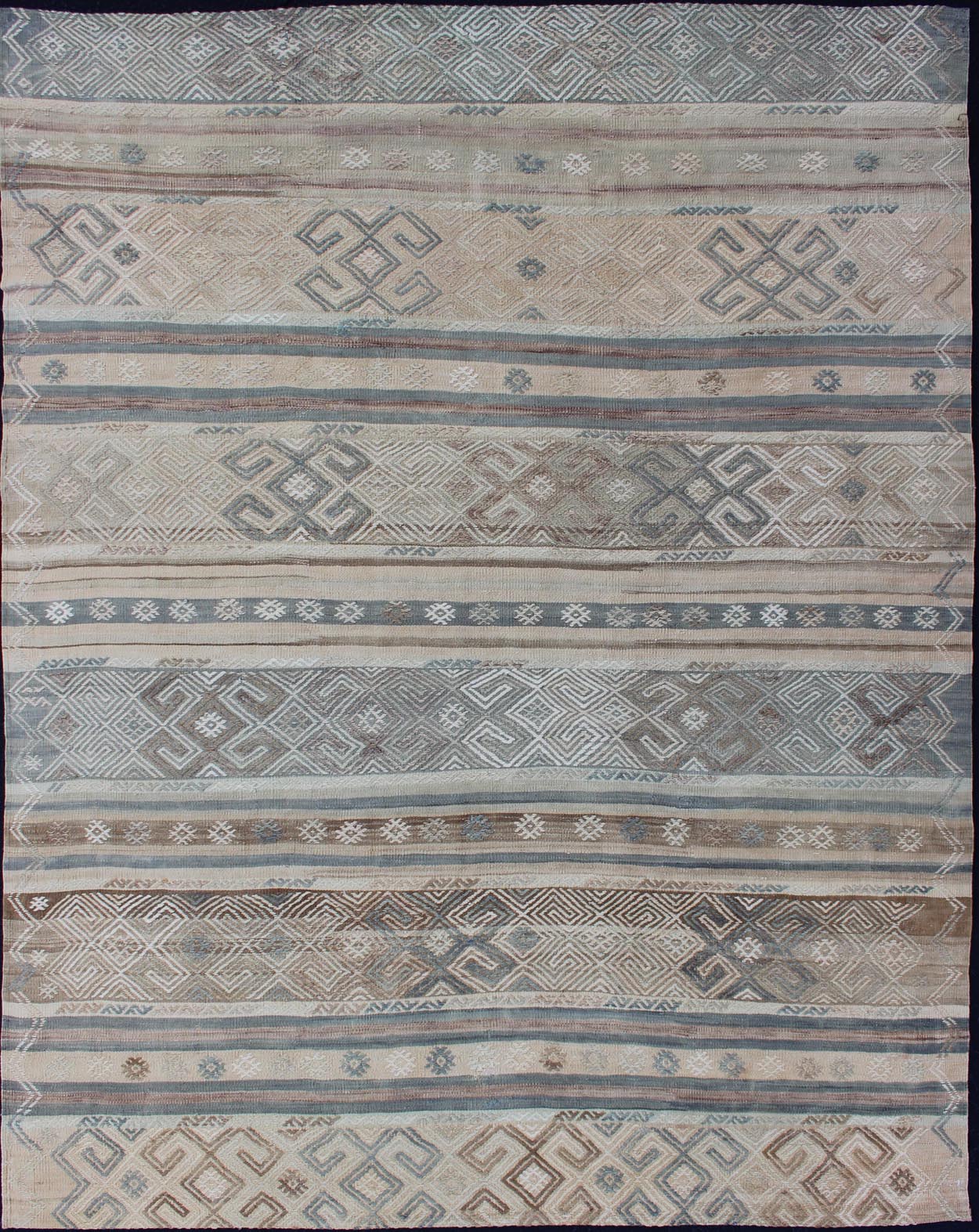 Measures: 5'9 x 7'7. This flat - woven Kilim runner from Turkey features an enticing composition consisting of stripes with fascinating geometric designs rendered in natural tones of brown and gray, as well as some blue shades. Vintage Kil... - Keivan Woven ArtsEN - 141087 - 11177Rug