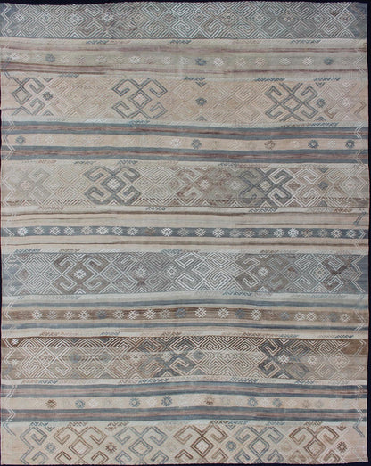 Measures: 5'9 x 7'7. This flat - woven Kilim runner from Turkey features an enticing composition consisting of stripes with fascinating geometric designs rendered in natural tones of brown and gray, as well as some blue shades. Vintage Kil... - Keivan Woven ArtsEN - 141087 - 11177Rug