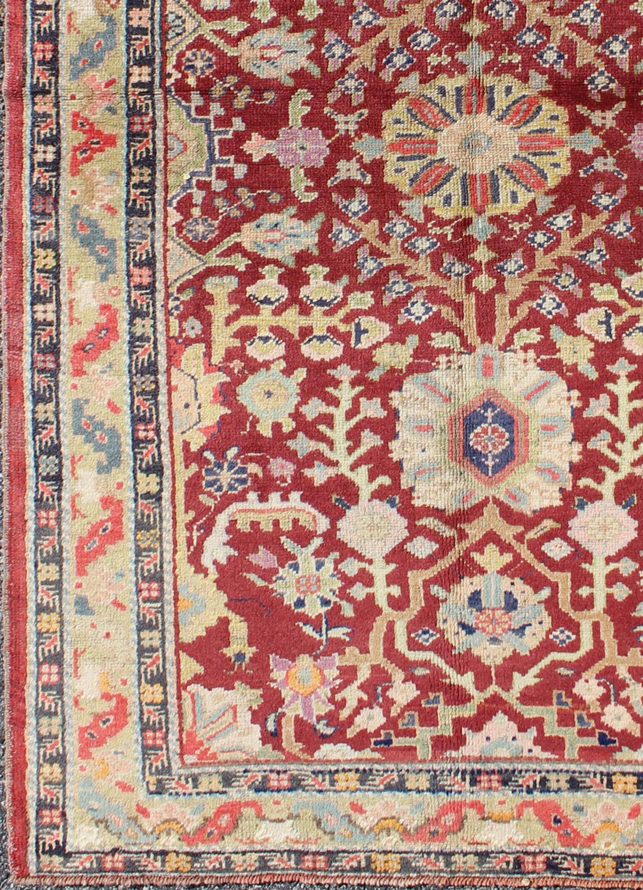Colorful Turkish Oushak Carpet with Scattered Vines and Flowers on a Red Field Oushak Carpet with Scattered Vines and Flowers on a Red Field rug/en - 141107 origin/ turkey kwarugs Handwoven in Turkey, this antique Oushak rug features scatte... - Keivan Woven ArtsEN - 141107 - 7145Rug