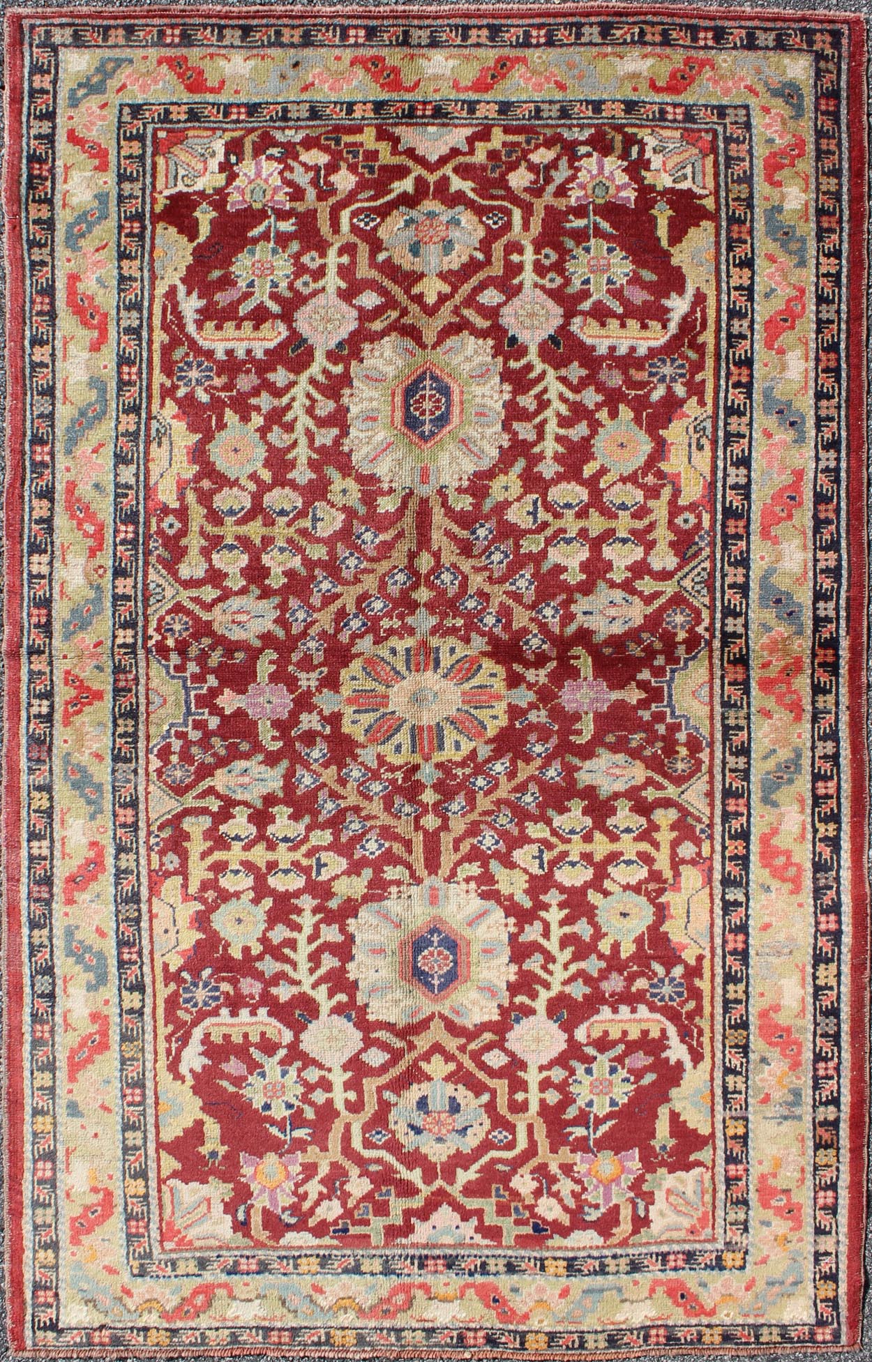 Colorful Turkish Oushak Carpet with Scattered Vines and Flowers on a Red Field Oushak Carpet with Scattered Vines and Flowers on a Red Field rug/en - 141107 origin/ turkey kwarugs Handwoven in Turkey, this antique Oushak rug features scatte... - Keivan Woven ArtsEN - 141107 - 7145Rug