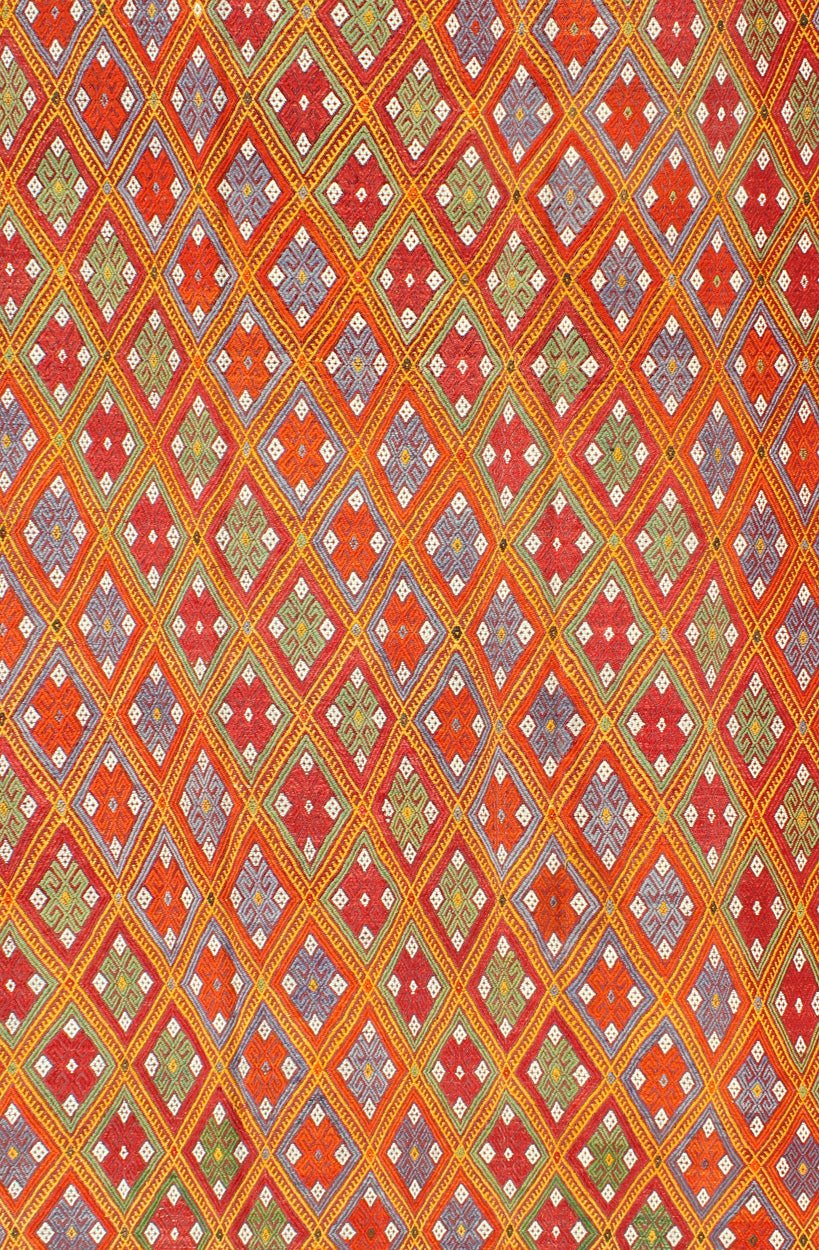 Vintage Turkish Embroidered Jijim Kilim With All - Over Diamond Design in Bright Colors Measures: 5'6'' x 9'0''. Featuring tribal diamond shapes with a spotted and speckled assortment of geometric elements, this finely woven embroidered Jijim s... - Keivan Woven ArtsEN - 141111 - 7149Rug