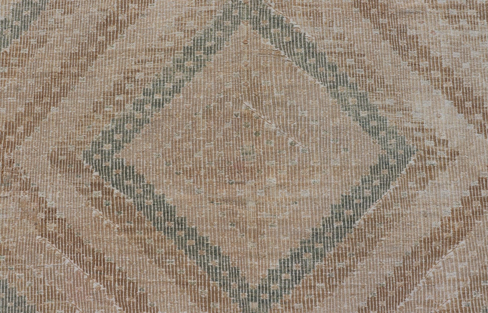 Vintage Hand - Woven Turkish Gallery Kilim Rug in Wool with Diamond Design This flat - weave tribal Turkish kilim has been hand - woven in wool. The rug features an all - over sub - geometric diamond design, and is rendered in blue and earthy tones; maki... - Keivan Woven ArtsEN - 141120 - 19838