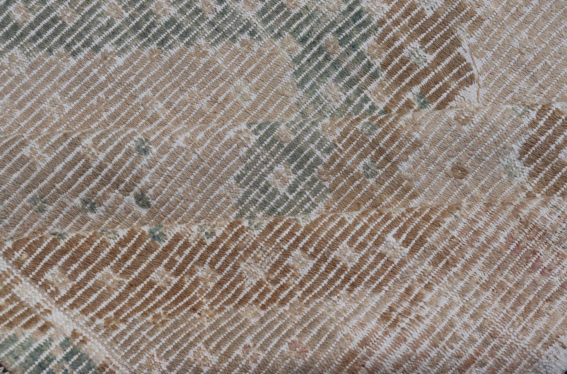 Vintage Hand - Woven Turkish Gallery Kilim Rug in Wool with Diamond Design This flat - weave tribal Turkish kilim has been hand - woven in wool. The rug features an all - over sub - geometric diamond design, and is rendered in blue and earthy tones; maki... - Keivan Woven ArtsEN - 141120 - 19838