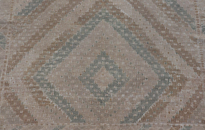 Vintage Hand - Woven Turkish Gallery Kilim Rug in Wool with Diamond Design This flat - weave tribal Turkish kilim has been hand - woven in wool. The rug features an all - over sub - geometric diamond design, and is rendered in blue and earthy tones; maki... - Keivan Woven ArtsEN - 141120 - 19838