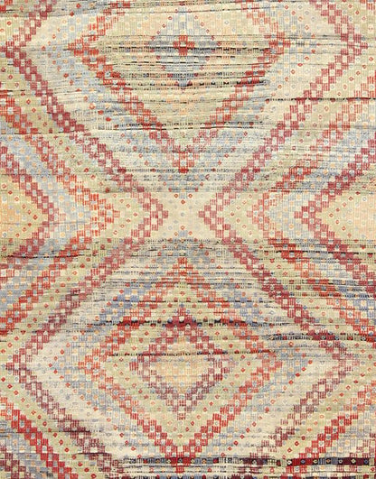 Vintage Turkish Embroidered Kilim in Green, Red and Light Blue Measures: 6'9'' x 10'9''. Featuring a large diamond pattern with a spotted and speckled assortment of geometric checkered elements, this unique vintage Kilim showcases an array of... - Keivan Woven ArtsEN - 141134 - 7159Rug