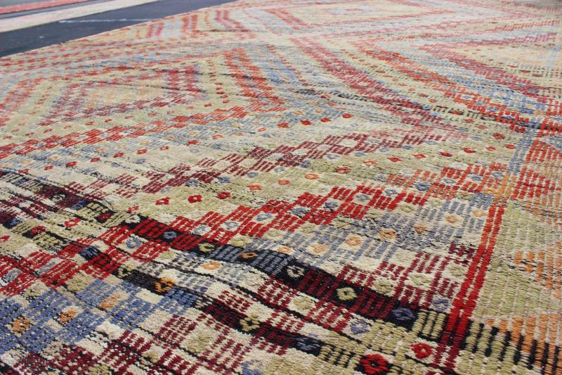 Vintage Turkish Embroidered Kilim in Green, Red and Light Blue Measures: 6'9'' x 10'9''. Featuring a large diamond pattern with a spotted and speckled assortment of geometric checkered elements, this unique vintage Kilim showcases an array of... - Keivan Woven ArtsEN - 141134 - 7159Rug