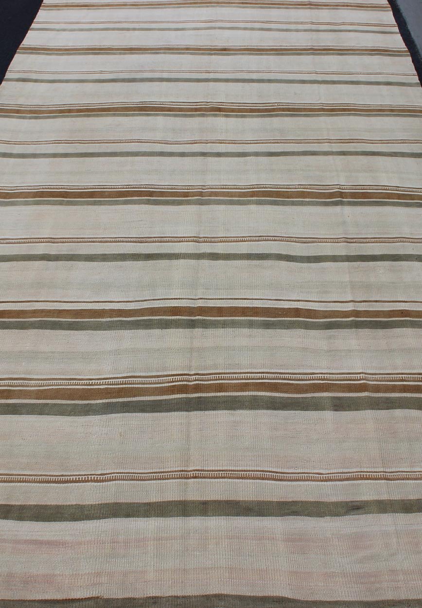 Large Kilim Vintage Rug With Green - Gray and Cognac Color in Stripe Design Vintage Turkish flat - woven Kilim with Minimalist stripe design, Keivan Woven Arts / rug en - 141237, country of origin / type: Turkey / Kilim, circa 1950. This kilim ... - Keivan Woven ArtsEN - 141237 - 11379Rug