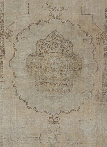 Antique Oushak Carpet in Taupe, Brown, Light Celadon Green and Neutral Colors Measures: 8'0'' x 12'1''. This antique Oushak wool rug features an over - sized medallion with detailed vines and flowers. A framework of floral motifs and styliz... - Keivan Woven ArtsEN - 141449 - 7203Rug