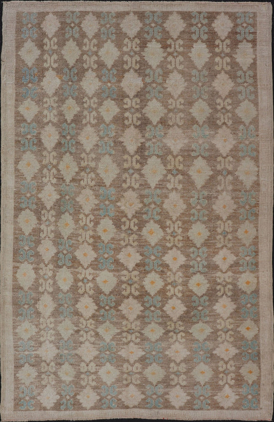 Vintage Turkish Tulu Rug with a Modern Design with All - Over Tribal Design This modern - design vintage Turkish Tulu rug features an all - over Design with a black zig zag line connecting the flowers. Set on light brown background, the flower colors ... - Keivan Woven ArtsEN - 141454 - 14650Rug