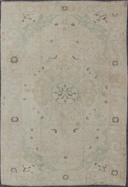 Muted Turkish Oushak Rug With Medallion in Shades of Taupe, Light Brown & Green. Muted Turkish Oushak rug with medallion design and floral pattern. rug en - 141693, country of origin / type: Turkey / Oushak, circa mid - 20th century This Tur... - Keivan Woven ArtsEN - 141693 - 6731Rug