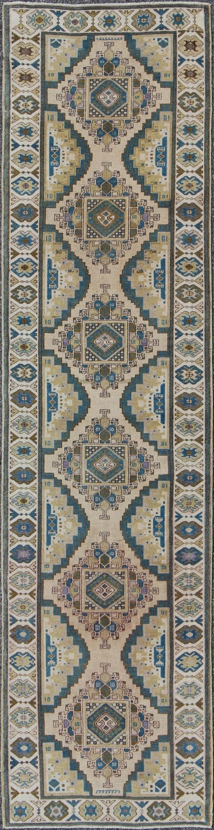 Teal, Green, Blue and Yellow Vintage Turkish Oushak Runner with Geometric Design Measures: 3'1'' x 12'5''. This vintage Turkish Oushak runner (circa 1930) features a unique blend of colors and an intricately beautiful design. The central ... - Keivan Woven ArtsEN - 141711 - 6739Rug