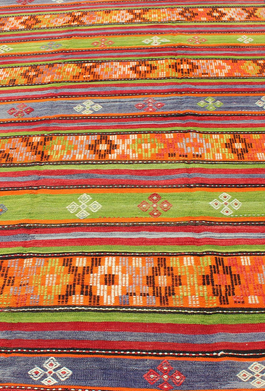 Colorful and Bright Turkish Kilim Rug with Stripe Geometric Design. Vintage Hand - Knotted Turkish Kilim, rug EN - 141719, country of origin / type: Turkey / Kilim, circa mid - 20th century. Featuring tribal shapes with a spotted and speckled asso... - Keivan Woven ArtsEN - 141719 - 6757