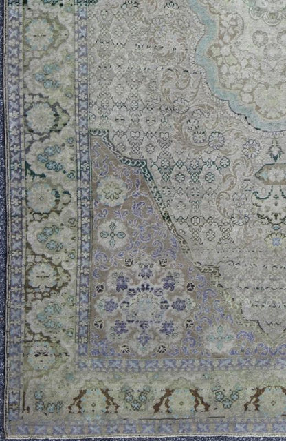 Vintage Turkish Rug with European Design in Various Shades of Lavender and Green This beautiful rug from mid - 20th century Turkey features a traditionally European design. The faint cream ground is home to the elaborate center medallion and surr... - Keivan Woven ArtsEN - 141743 - 6765Rug