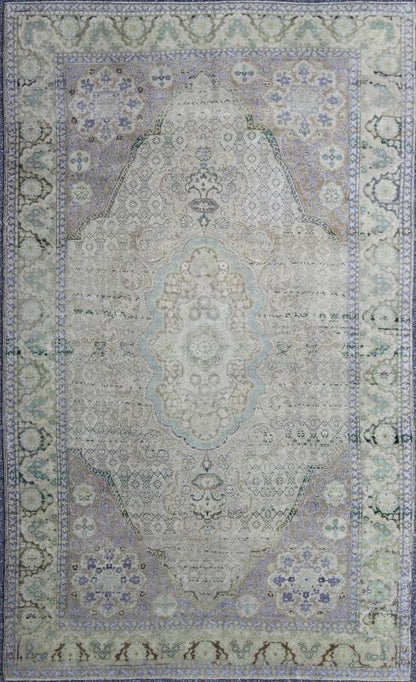 Vintage Turkish Rug with European Design in Various Shades of Lavender and Green This beautiful rug from mid - 20th century Turkey features a traditionally European design. The faint cream ground is home to the elaborate center medallion and surr... - Keivan Woven ArtsEN - 141743 - 6765Rug