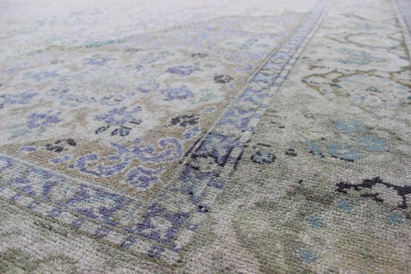 Vintage Turkish Rug with European Design in Various Shades of Lavender and Green This beautiful rug from mid - 20th century Turkey features a traditionally European design. The faint cream ground is home to the elaborate center medallion and surr... - Keivan Woven ArtsEN - 141743 - 6765Rug