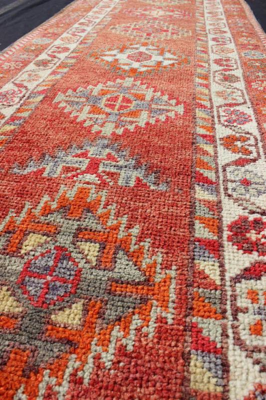 Vintage Turkish Oushak Runner with Medallions in Rust Red and Multi Colors Measures: 2'7'' x 11'6''. This Oushak runner from mid - 20th century Turkey features an all - over multi - medallion design rendered in geometric patterns and a wide variety... - Keivan Woven ArtsEN - 141745 - 7715Rug