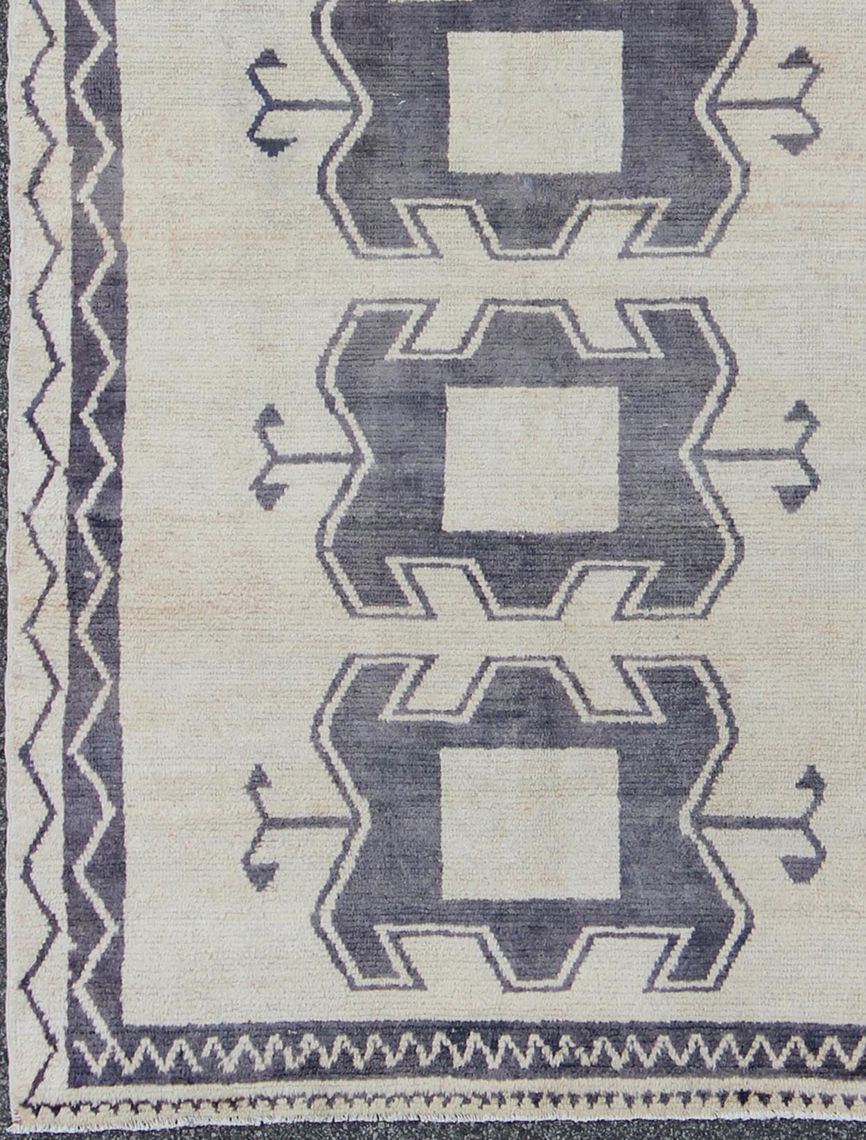 Midcentury Turkish Tulu Rug with Tribal Design in Purple/Gray and Cream Measures: 4'11 x 9'8 Turkish Tulu rug with tribal medallion design and cream in deep Purple/Gray and ivory. Tribaldesign Tulu rug with tribal design. Keivan Wo... - Keivan Woven ArtsEN - 141883 - 9412Rug
