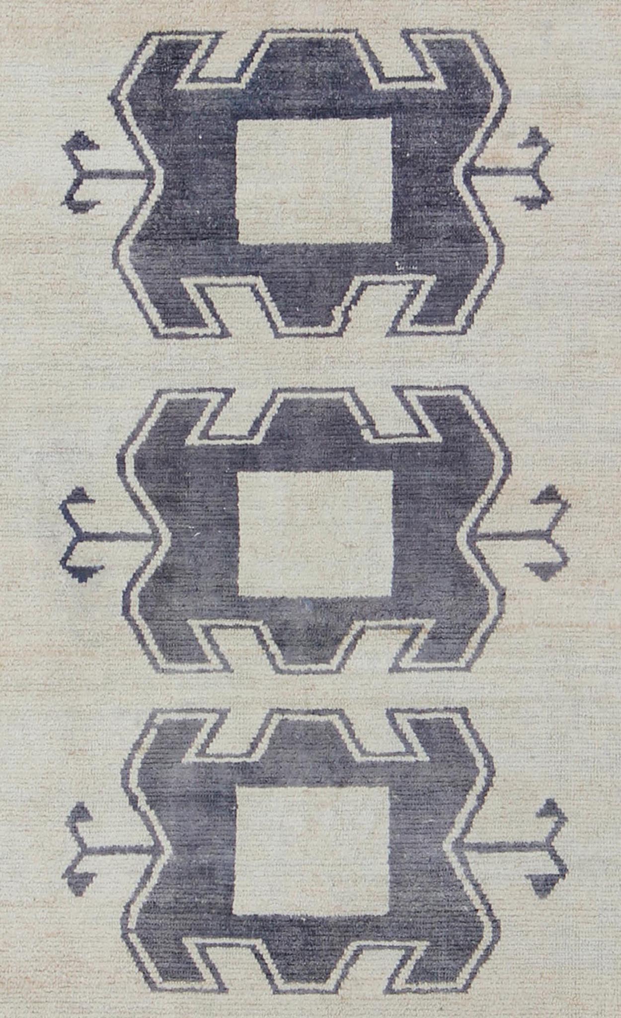 Midcentury Turkish Tulu Rug with Tribal Design in Purple/Gray and Cream Measures: 4'11 x 9'8 Turkish Tulu rug with tribal medallion design and cream in deep Purple/Gray and ivory. Tribaldesign Tulu rug with tribal design. Keivan Wo... - Keivan Woven ArtsEN - 141883 - 9412Rug