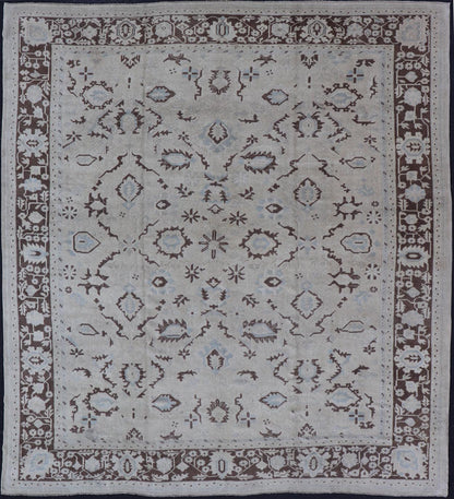 Square Shaped Vintage Turkish Oushak Rug with Brown, Lt. Blue and Cream Tones Keivan Woven Arts / rug EN - 141954, country of origin / type: Turkey / Oushak, circa mid - 20th Century. Measures: 11'0'' x 12'5''. This vintage Turkish Oushak rug from th... - Keivan Woven ArtsEN - 141954 - 7835Rug
