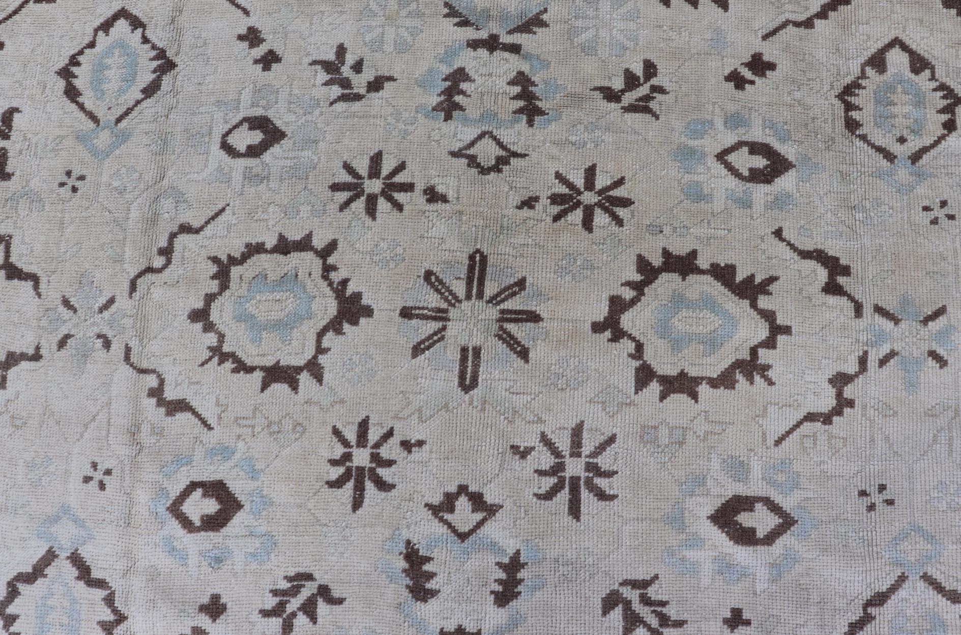 Square Shaped Vintage Turkish Oushak Rug with Brown, Lt. Blue and Cream Tones Keivan Woven Arts / rug EN - 141954, country of origin / type: Turkey / Oushak, circa mid - 20th Century. Measures: 11'0'' x 12'5''. This vintage Turkish Oushak rug from th... - Keivan Woven ArtsEN - 141954 - 7835Rug