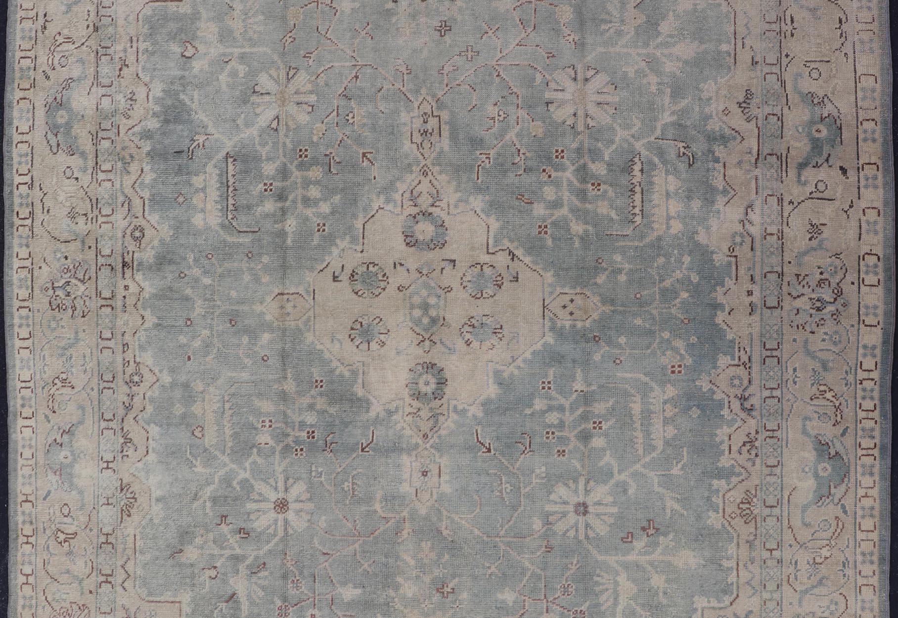 Antique Turkish Oushak Rug with Medallion With Light Gray - Blue, Cream, and Brown. Keivan Woven Arts / rug EN - 142046, country of origin / type: Turkey / Oushak, circa Early - 20th century. Measures: 10'9 x 14'2. Classical designs and muted colors a... - Keivan Woven ArtsEN - 142046 - 8038Rug